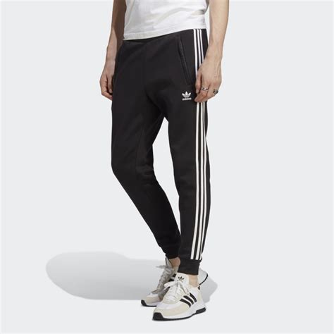 adidas broek met gouden streep zonder adidas teken|Adidas sportbroeken retro.